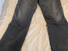 Front of jeans.  These dark gray jeans have only faded slightly over the years. 