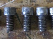 once again is the one in the middle with the stripe going through the middle of the knurl, OEM ?