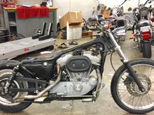 Bike down to bare bones. Re painted the lower forks, air cleaner cover, belt guard, and rear sprocket. I also did the strut covers. I used Harley Davidson texture paint. The look is awesome in person and the motor on my dyna is texture from the factory. I'm a sucker for it.