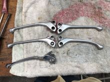 Side B
Chromed broken lever that was on the bike on the bottom left