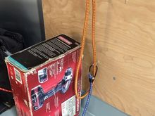 A floor batten for some tubs that things like rags, wax, oil and other stuff can go in.  Another one sits on that one for various travel supplies and things we need to take for rentals.  Wall mount for the bungee cord to hold them from going anywhere.