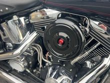 Used Duplicolor MetalCast to paint the bolt an anodized red to get very close to the red powder coat on the wheels