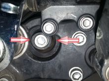 Here is a picture of the right hand side front  mount on my bike.  You can plainly see there is no gap to the rear of the bolt and lots to the front.