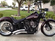 New additions to the Train...Heartland 180 Wide Tire...Harrison Specialties Led turn signals...14" Wild1 Outlawz...Arlen Ness Black Oval Mirrors...Black Powder coated Lower tubes