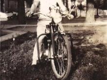 MY dad on his bike in the 40s. I dont what kind it was.