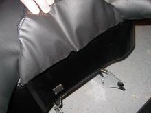 No holes in the lower, this pic I'm holding up the "flap " lower portion of the backrest