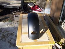 spray painted rear fender