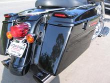 I installed a spoiler light kit on top of my saddlebags that act as extra running lights and brake lights. I think they look pretty good.