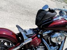 Trick seat still flips up &amp; has passenger pillion support hidden under seat.