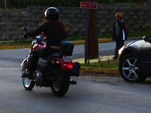 My boy watching his mom ride (taken by grandma)