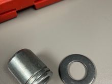 0.125" thick washer, and spacer milled by 0.125"