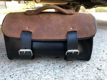 Front of the bag with double loop straps. The bag is secured to your luggage rack using straps that attached through the loops in the back of the bag.