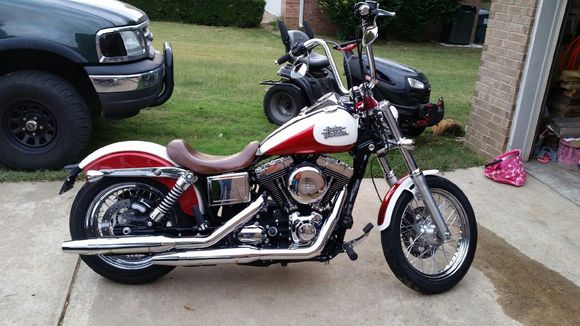 Brown leather mustang wide tripper.