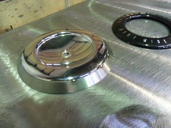Ok, I got the stainless ring welded and polished on the center cap.