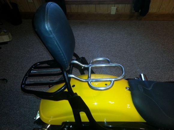Clipped on the existing luggage rack.