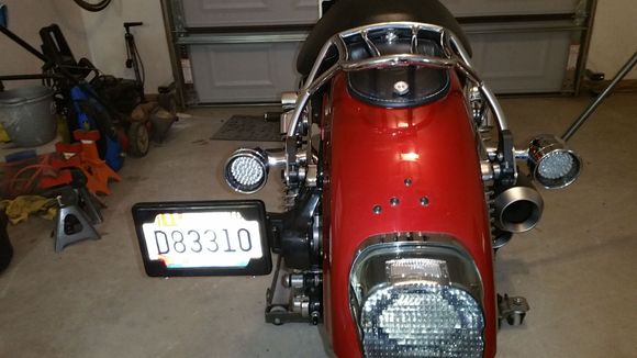 done.  will have to swap out the tail light for a on-windowed unit since the plate is no longer there.  scope keeps creeping