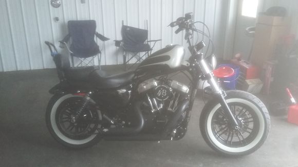 Not a great pic (dropped my phone and cracked the camera) but...it blends in. It will leave some oul down the pipes and oil tank if im riding her hard but...oh well.