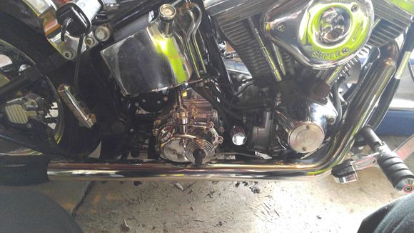 Had to dimple the front pipe to clear the kicker housing.