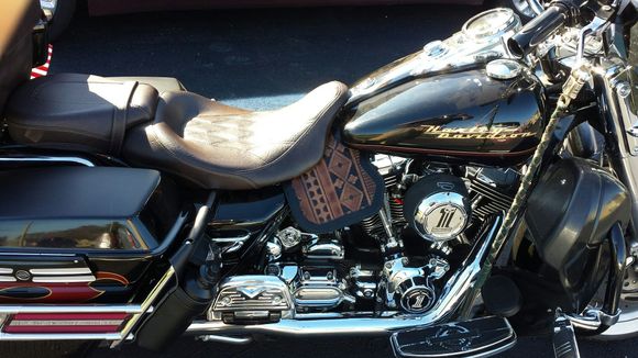 Heat shield with southwestern overlay. Here is the link https://shop.captain-itch.com/Crotch-Cooler-with-Southwestern-style-embossed-Leather-brown-Crotch-Cooler-SW-style-brown.htm