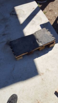Mines modified a lil different w yoga puzzle matting. Its very strong and absorbent. It was very snug to get it in but doable. So i actually rolled the back tire up on a piece of wood to get plenty of room. When i jack it up i just pulled the wood out from under the tire w a view hits of the hammer no prob.hope this helps someone