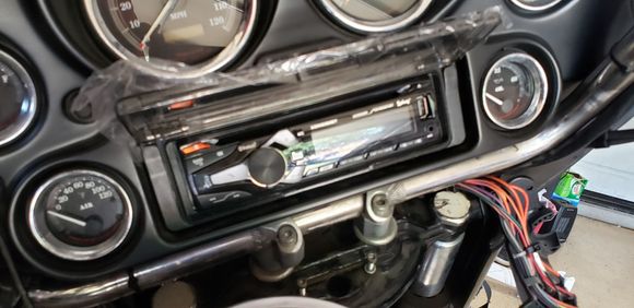 New and modern head unit with bluetooth, usb, spotify. Yeah, I sacrificed thumb controls but I can always go back to reinstall them if needed.