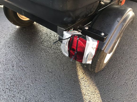 Duct tape and zip ties came in handy when my tag-a-Long got “tagged”