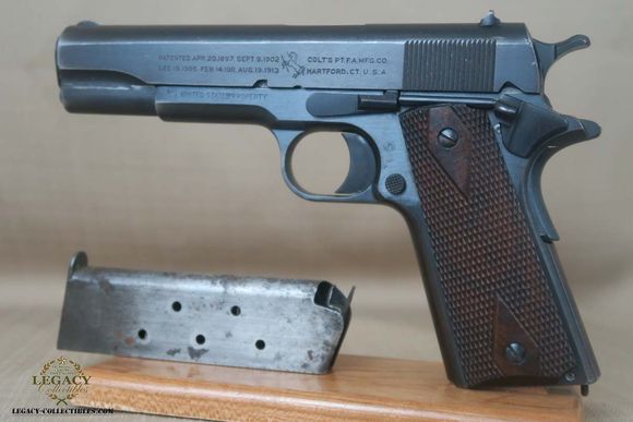 Colt M1911 made in 1917 
Says Property of the United States on the side. 
