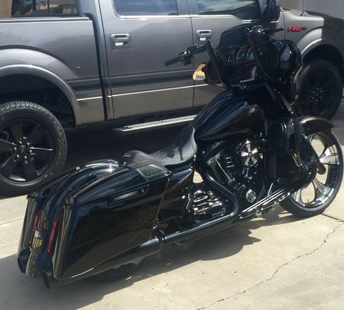 I think that is the Baddest Black CVO or Harley that i have ever seen, beautiful work.