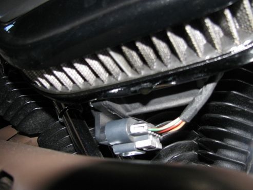 Hard to see in this pic but the air filter is saturated and there's an oil drop on the back plate about to drip.