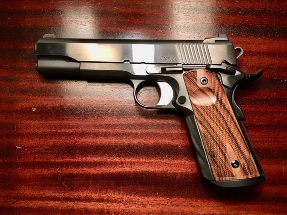 Dan Wesson Valor 9mm, blued. Can’t get blued anymore. Thks one wouldn’t run well. Misbehaved at matches, so I sold it.