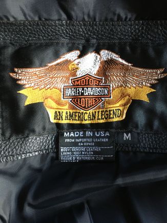 This is the bid tag on the inside lining by the neck.