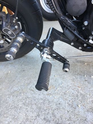 Rock-it heel n toe shifter, cut down for upshifting so I just need to slide heel to right a bit and extended down shifter so I can shift without altering foot position