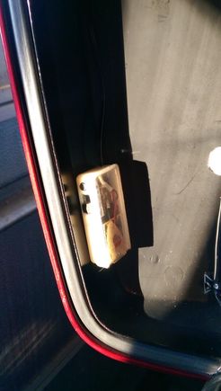 Double-sided taped, sits directly above where the liner sticks out with the tour pack wiring, so not likely to get shut against something.  Plus virtually no chance that a slide switch will accidentally get bumped.