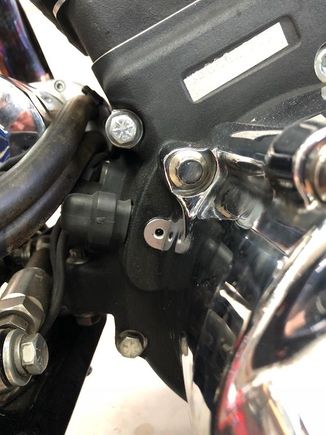 There's the little hole oil was oozing out of..I have no idea what was there.  We didn't remove any screw from that area