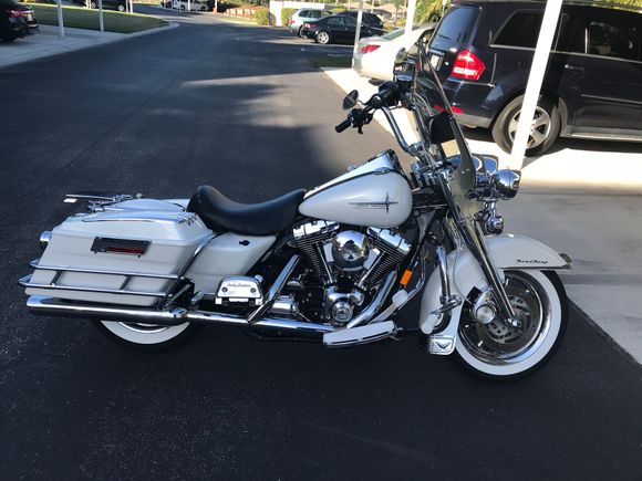 Painted it in 2013 pearl white/silver specs...all white rubber with 4 inch risers....all lights LED, wagon rims, stage 3, ( 88>96  ) S&S 585 cams..