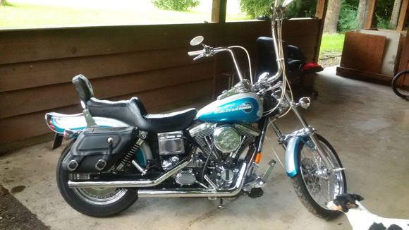 1995 Dyna Wide Glide in thar blue color with new V&H Straight Shots.