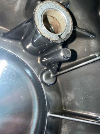 Outside primary. Starter race bearing. See the deep gouge. 