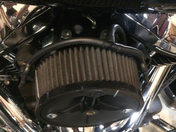 I decided to try and stop the bleeding into the heart of the beast. There is no good reason to vent an engine into the intake... I used the stock breather bolts and tubing with my S&S air cleaner, ran the vent tube down and forward of the engine and zipped it at the bottom. :) prognosis looks good. :)
