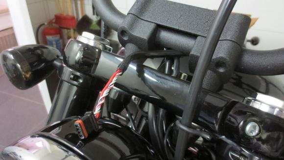 The wire unp^lugged from the rubber grommet