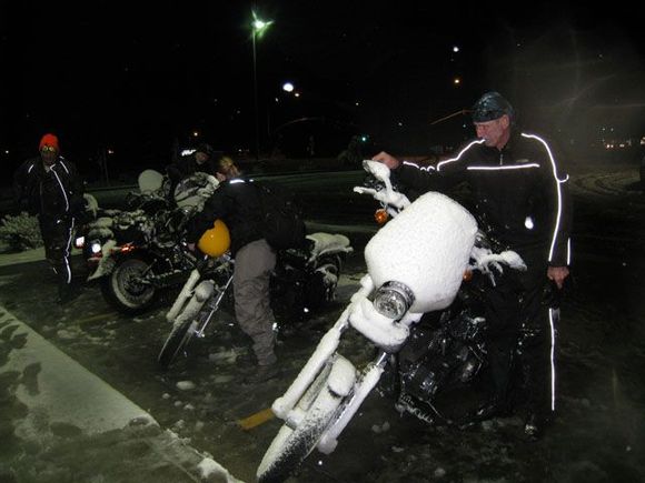 Dave (dwe.61), Mondo (metalspike), Michele (fdatx2), and Joe (joe.1955)... stand in slush and clean snow off of bikes, getting ready to head to a hotel for the night. No way we are riding home tonight!
Show Low, AZ