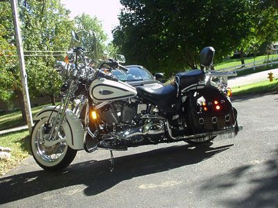 I was content that I had a bike with it's own claim to fame, being the first of a line, that no one knew at the time, would end in 2003, when the last FLSTS would be sold. 'Springers' had a bad rap from the old days, supposedly an uncomfortable ride, which is why the 'hydra-glide' front ends had replaced them 50 years earlier. But they did not deserve the rap, as I had ridden both, and this bike rode as smoothly as any pneumatic I had ridden, but H-D is about $$$, and I guess the sales were not justifying the assembly line requirements, so they stopped making them. Possible 'protests' brought them back, as they re-released a 'Springer Classic' in 2005(?), and still have at least one Springer model available today, for us die-hard 'spring-heads'.