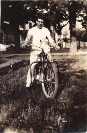 MY dad on his bike in the 40s. I dont what kind it was.