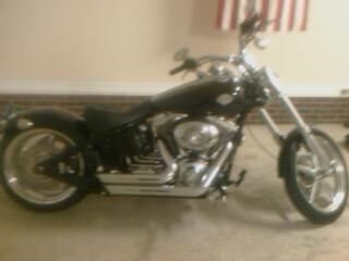 Vance and hines ShortShot Staggards and fxcw seat.  Thanks Gib the bracket works!