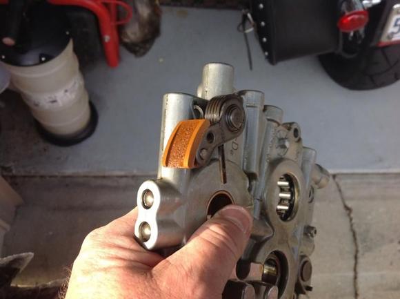 Old outer cam tensioner had a lot of wear 17,000 miles