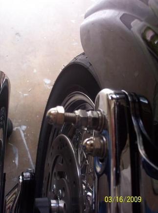 Used 5/16 x about 3" rod for fender / rear bag bolt, 5/16 x about 1 1/2" for turn signal hole. Nut w/loctite, lockwasher, and washer inside fender. Washer, lockwasher, &amp; locknuts @ strut., topped with acorn nuts.