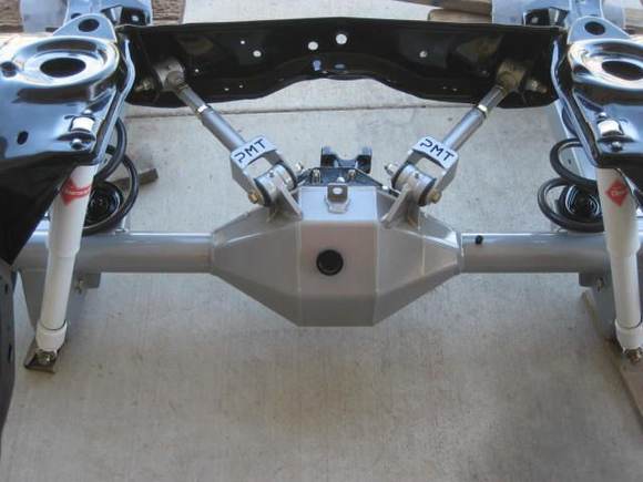 black powdered frame, silver control arms (adj.), silver Alston chassisworks fab9 housing strange nodular 3rd member with strange 31 spline axles.