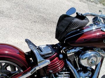 Trick seat still flips up &amp; has passenger pillion support hidden under seat.
