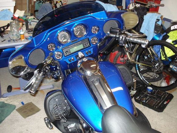 After winter upgrades; chrome guage bezels, painted inner, FLHX mirrors w/chrome blinker covers, tour pack luggage rack, SE Stage 1 exposed filter element, Kuryakyn ISO grips w/throttle boss