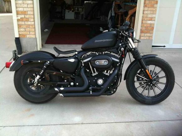 883N with Lick's Slimline solo springer seat and Wide drag bars...and of course the short shots