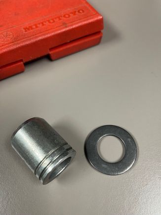0.125" thick washer, and spacer milled by 0.125"